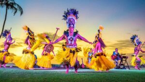 A group of dancers performs at a feast in Hawaii.